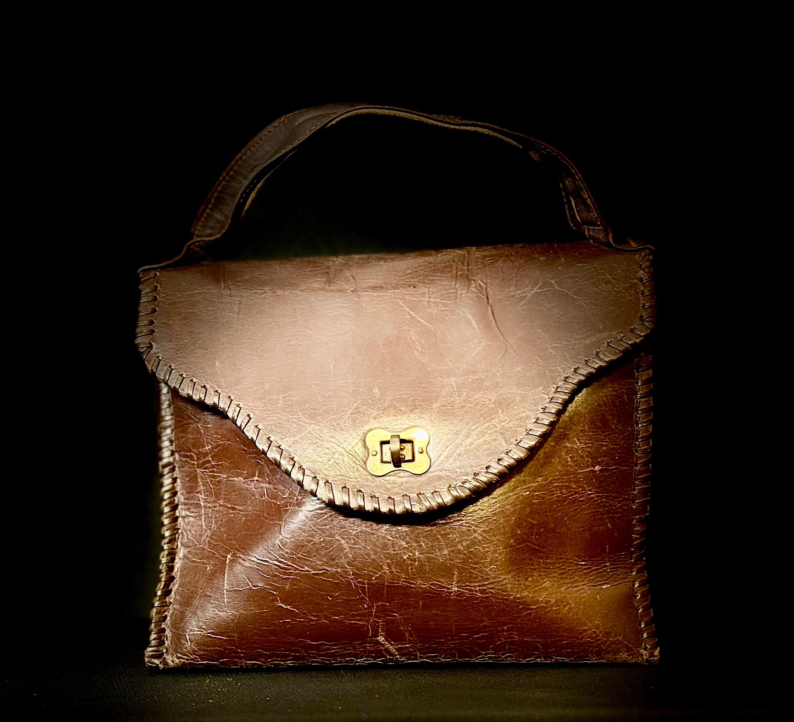 Late 1940s Chocolate Brown Leather Handbag
With Original 1963 Receipts Found Inside