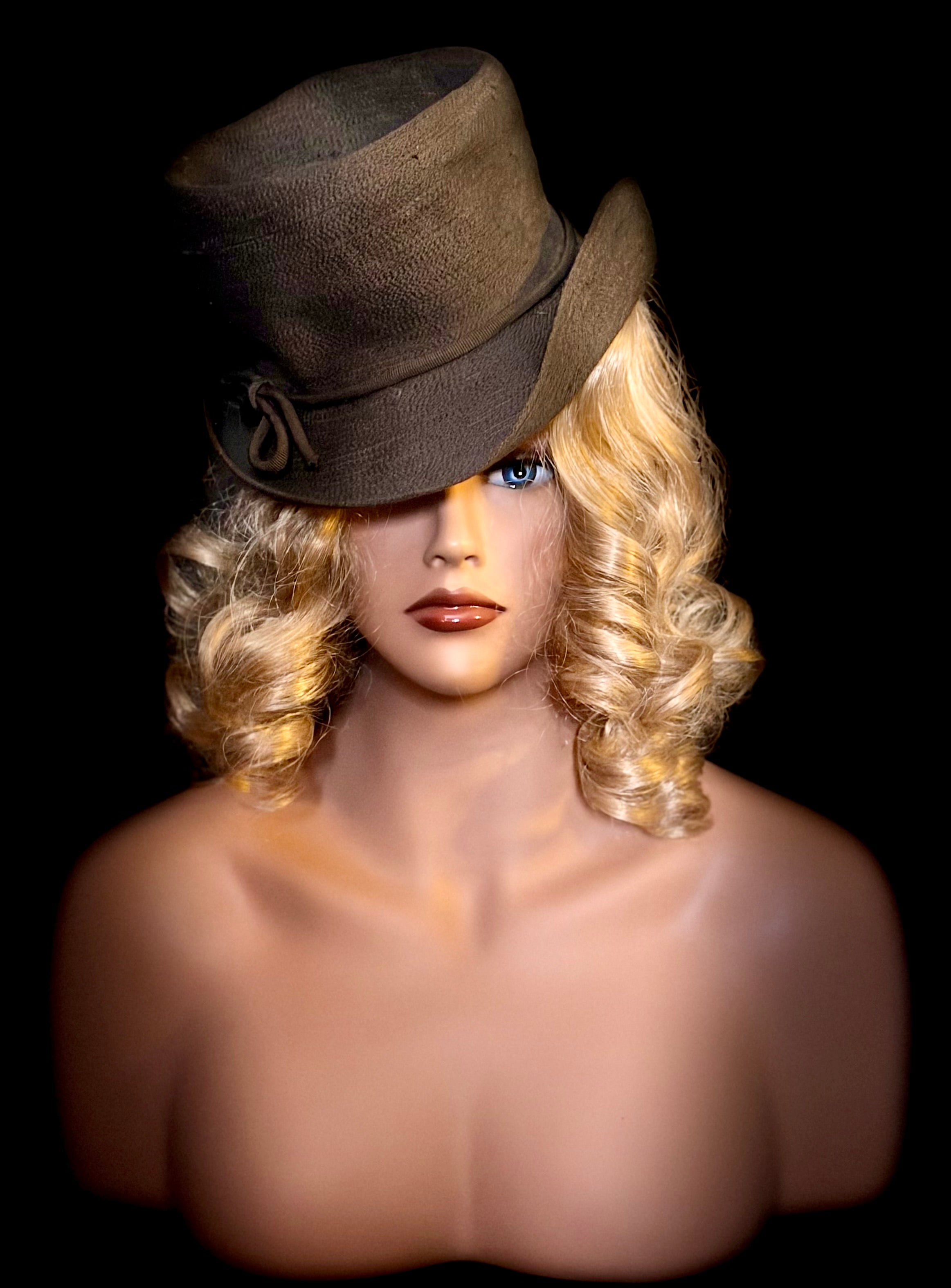 1940s Brown Tilt Topper Hat
- Wartime Millinery