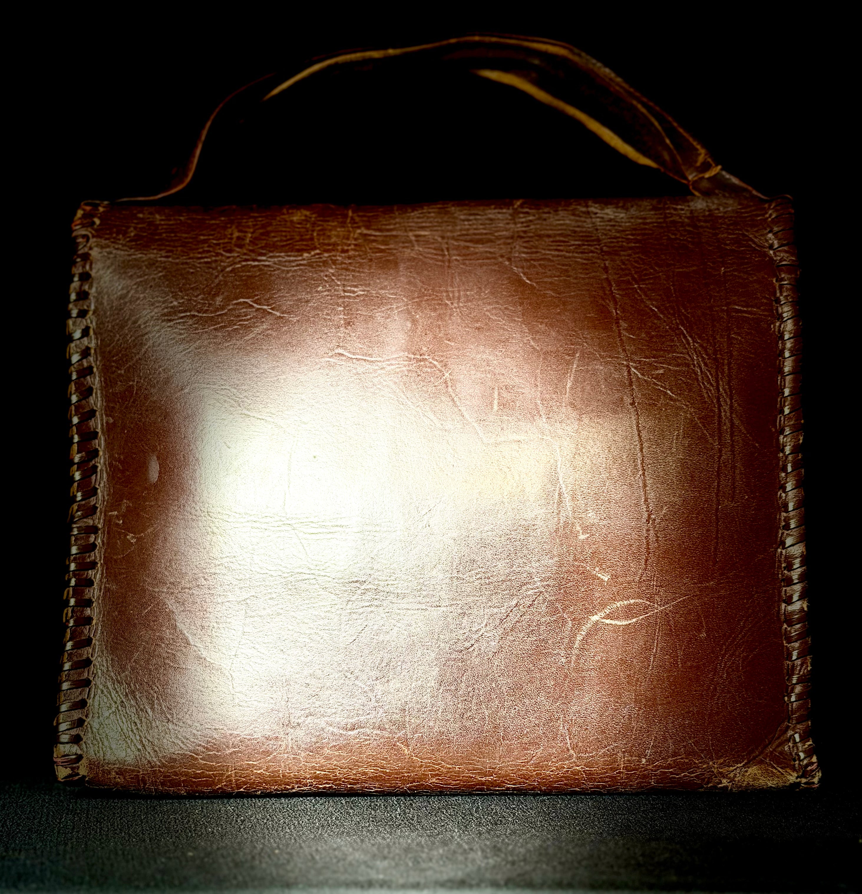 Late 1940s Chocolate Brown Leather Handbag
With Original 1963 Receipts Found Inside